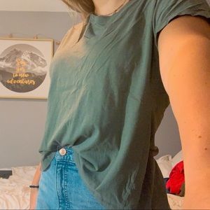 green athletic shirt